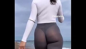 Sexy Latina walking in see through leggings